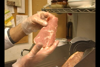 Chef Charles demonstrates a good cut of meat